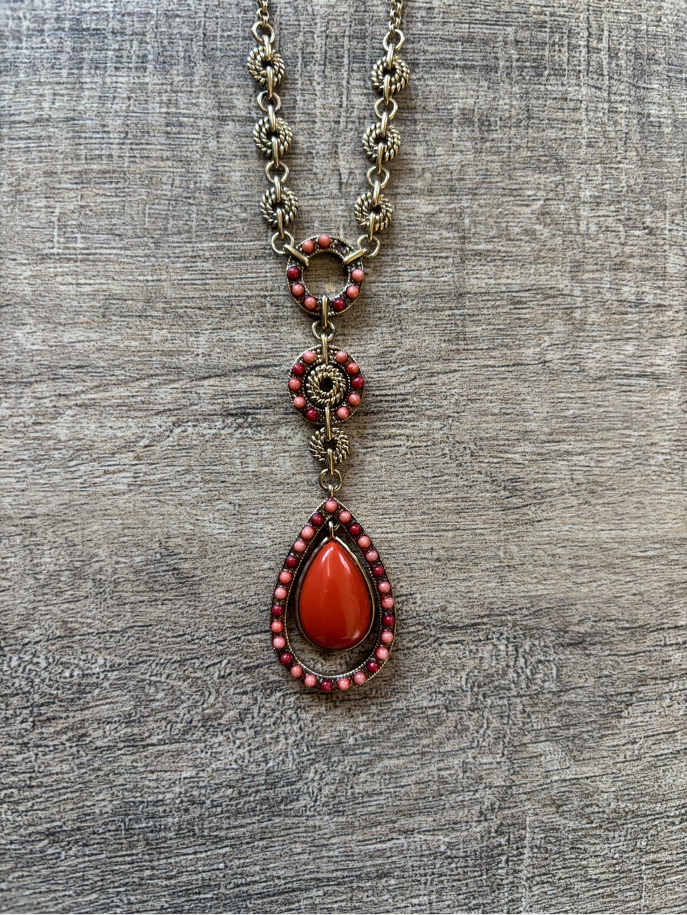 Monet women’s coral orange and gold color teardrop pendant Y mental necklace